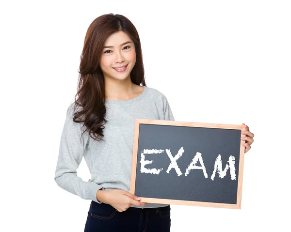 Asian woman in grey sweater with blackboard — Stock Photo, Image