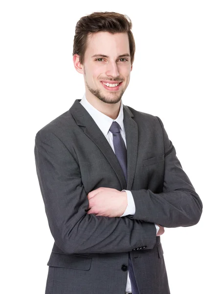Young handsome businessman in business suit — Stock Photo, Image