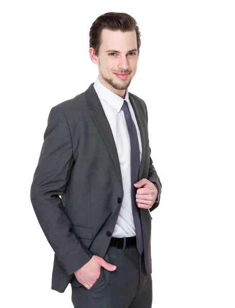 Joven hombre de negocios guapo en traje de negocios —  Fotos de Stock