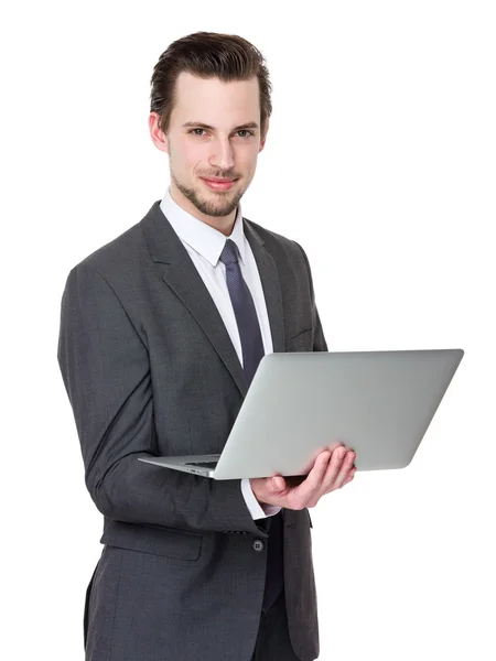 Young handsome businessman in business suit — Stock Photo, Image