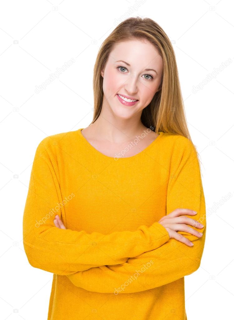 Young caucasian woman in yellow sweater — Stock Photo © leungchopan 79893474