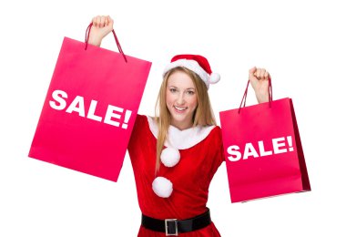 kadın Noel kostümü ile alışveriş torbaları