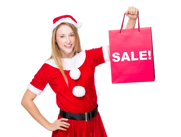 Mujer en traje de Navidad con bolsa de compras —  Fotos de Stock