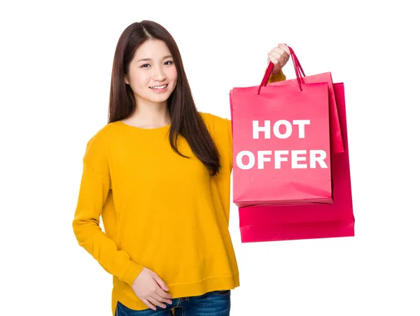 Asian woman holding shopping bags — Stock Photo, Image