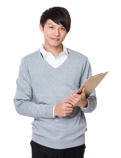 Asiatische junge Geschäftsmann im grauen Pullover — Stockfoto