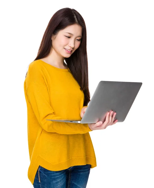 Asian young woman in yellow sweatshirt — Stock Photo, Image