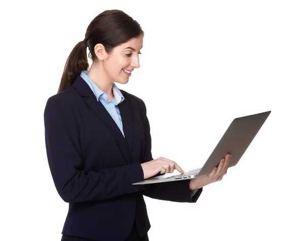 Caucasian brunette businesswoman in business suit — Stock Photo, Image