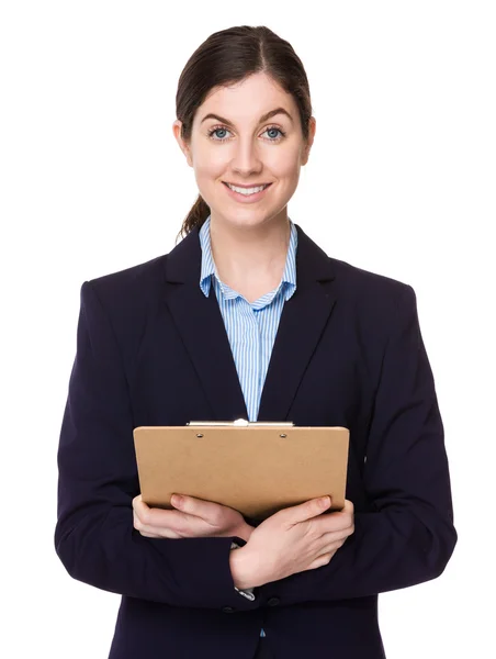 Kaukasische brunette zakenvrouw in pak — Stockfoto