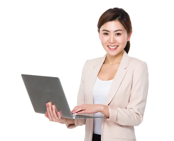 Asian young businesswoman in business suit — Stock Photo, Image