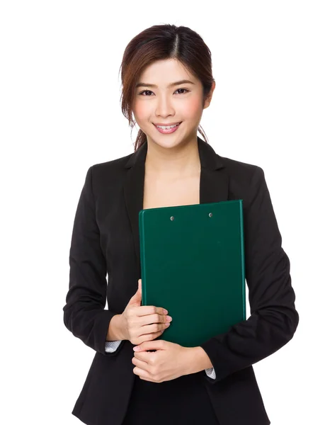 Businesswoman holding clipboard — Stock Photo, Image