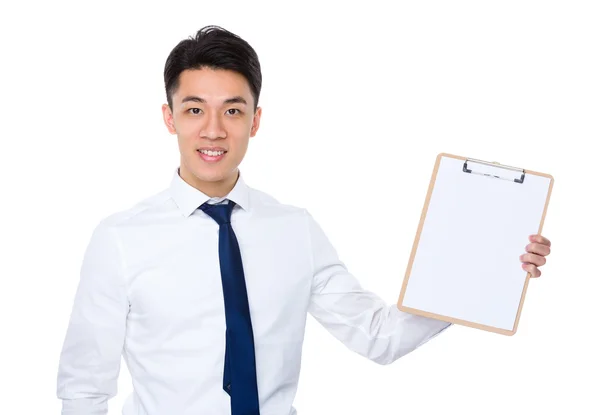 Businessman showing clipboard — Stock Photo, Image
