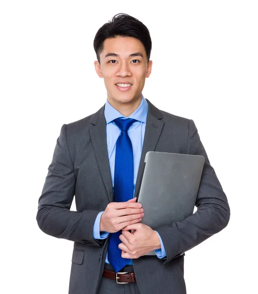 Businessman holding  laptop — Stock Photo, Image