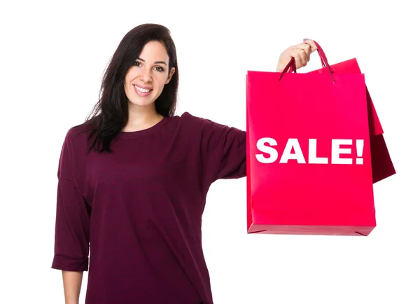 Mulher segurando sacos de compras — Fotografia de Stock