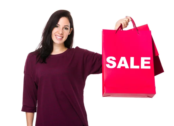 Mulher segurando sacos de compras — Fotografia de Stock