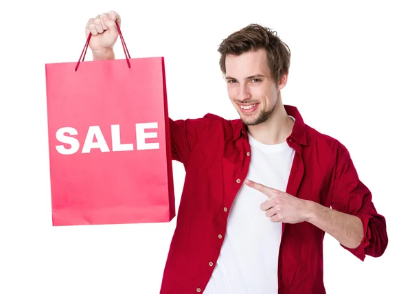 Man holding  paper bag — Stock Photo, Image