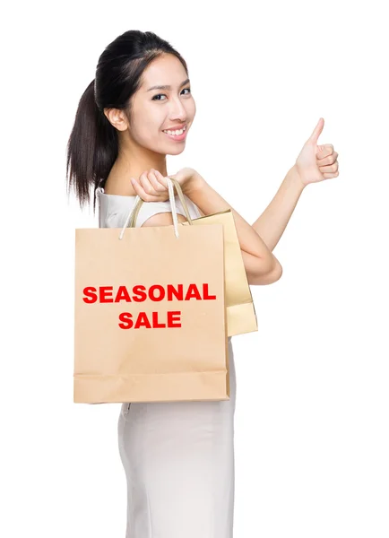 Woman holding  bags — Stock Photo, Image