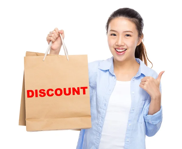 Asian young woman with shopping bags — Stock Photo, Image