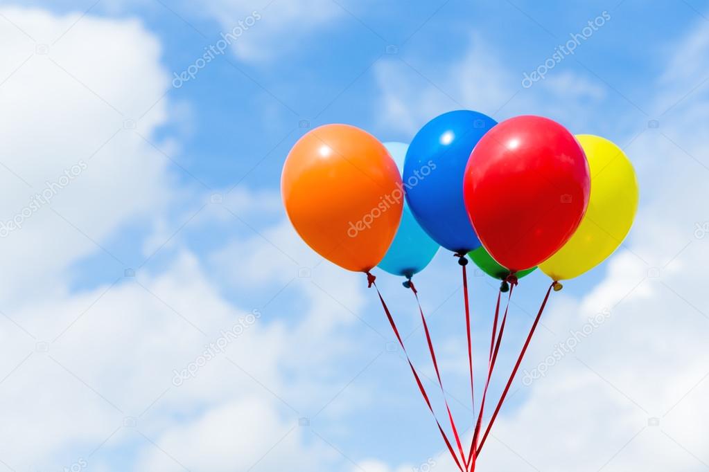 colorful balloons in blue sky