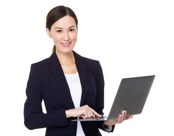 Asian young businesswoman in business suit — Stock Photo, Image