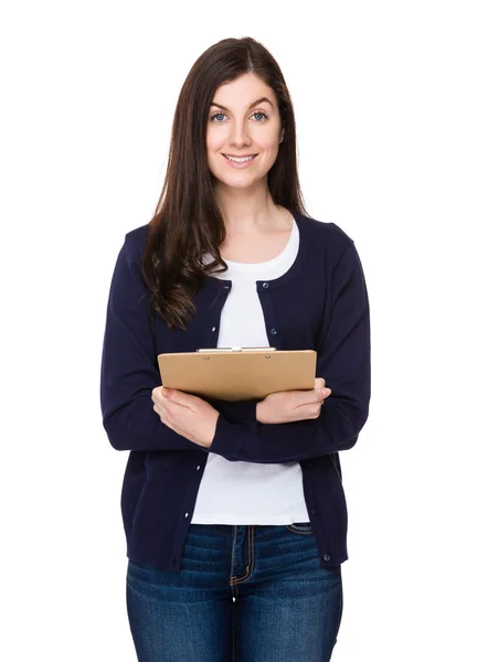 Kaukasische brunette vrouw in blauwe vest — Stockfoto