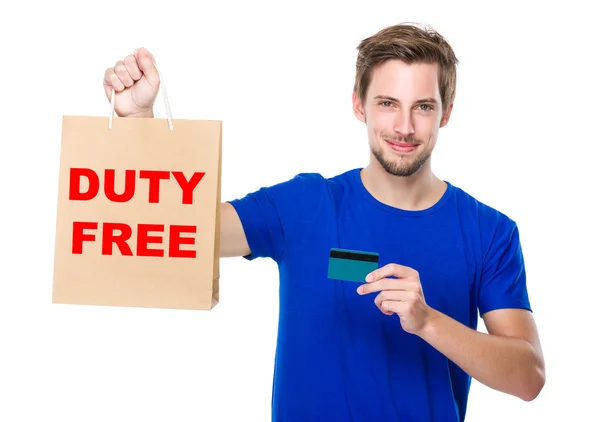 Man with shopping bag and credit card — Stock Photo, Image