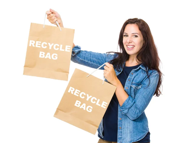 Caucasian woman holding shopping bags — Stock Photo, Image