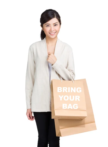 Asian woman holding shopping bags — Stock Photo, Image