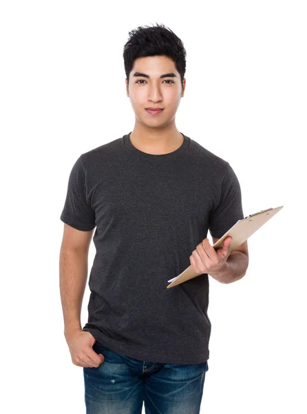 Asijský mladík v hnědé triko — Stock fotografie