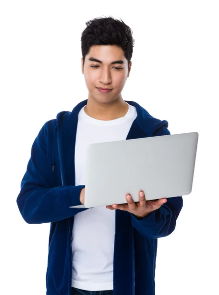 Asian young man in blue sweater — Stock Photo, Image