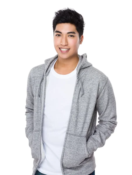 Asian young man in grey sweater — Stock Photo, Image