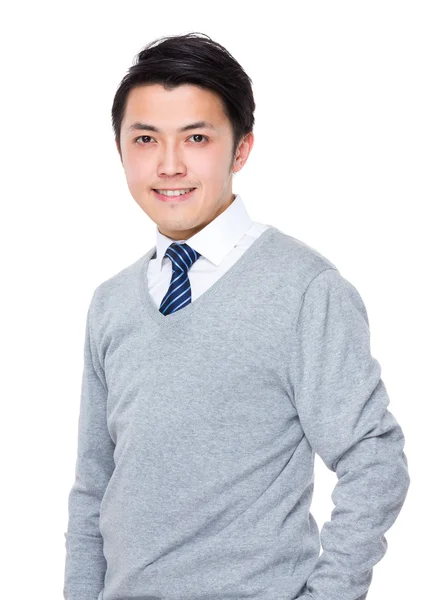 Asiatischer junger Geschäftsmann im grauen Pullover — Stockfoto