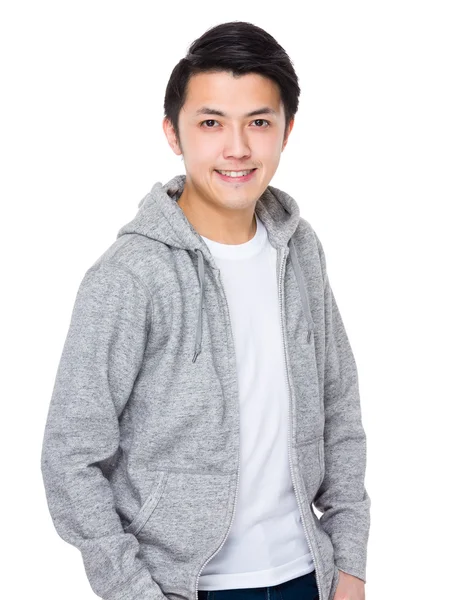 Asiatiska ung man i grå hoodie — Stockfoto