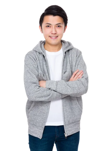 Aziatische jonge man in grijs hoodie — Stockfoto