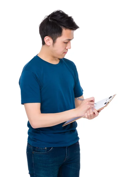 Asian young man in blue t-shirt Royalty Free Stock Photos