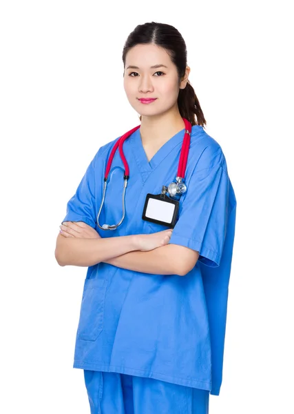 Mujer asiática médico en azul uniforme — Foto de Stock