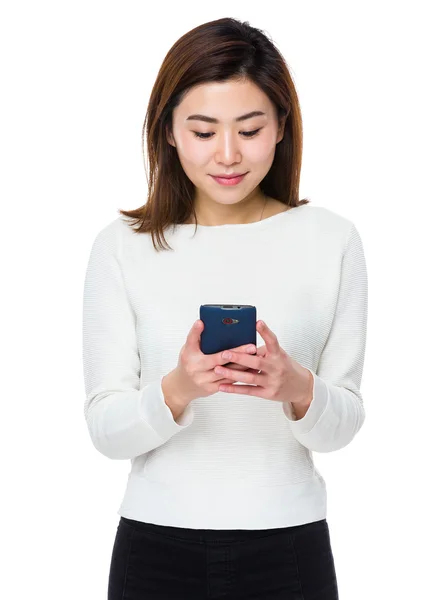 Asian young woman in white sweater — Stock Photo, Image