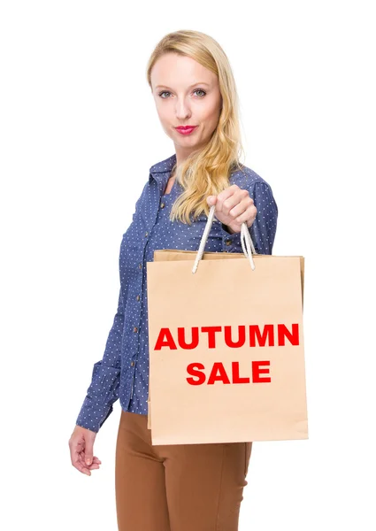 Caucasian blond woman with shopping bags — Stock Photo, Image