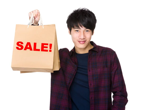 Aziatisch mens bedrijf shopping tassen — Stockfoto