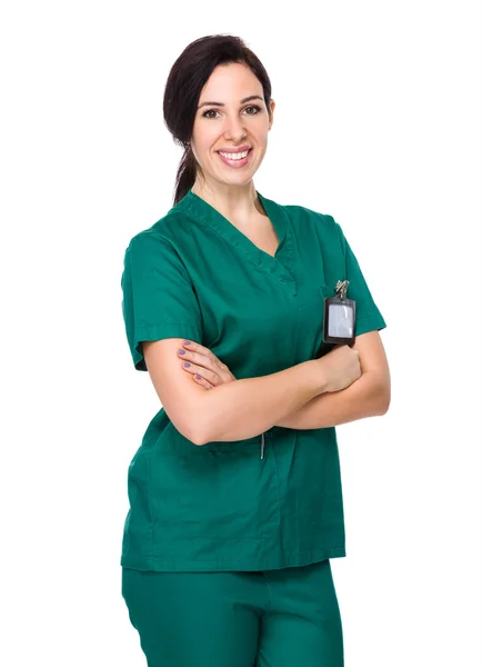 Branco feminino médico em verde uniforme — Fotografia de Stock