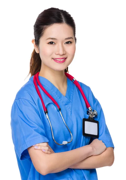 Asiática médico feminino em uniforme azul — Fotografia de Stock