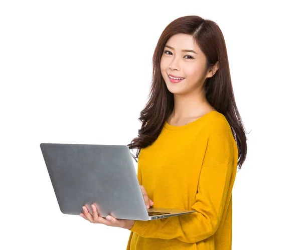 Asian young woman in yellow sweater — Stock Photo, Image