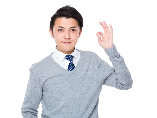 Asijské pohledný podnikatel v šedém svetru — Stock fotografie
