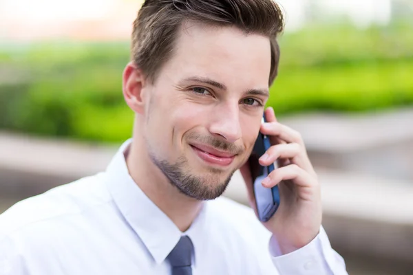 Businessman in white shirt at outdoor — Stock Photo, Image