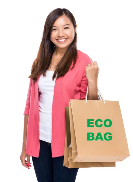 Asijské mladá žena s nákupní tašky — Stockfoto