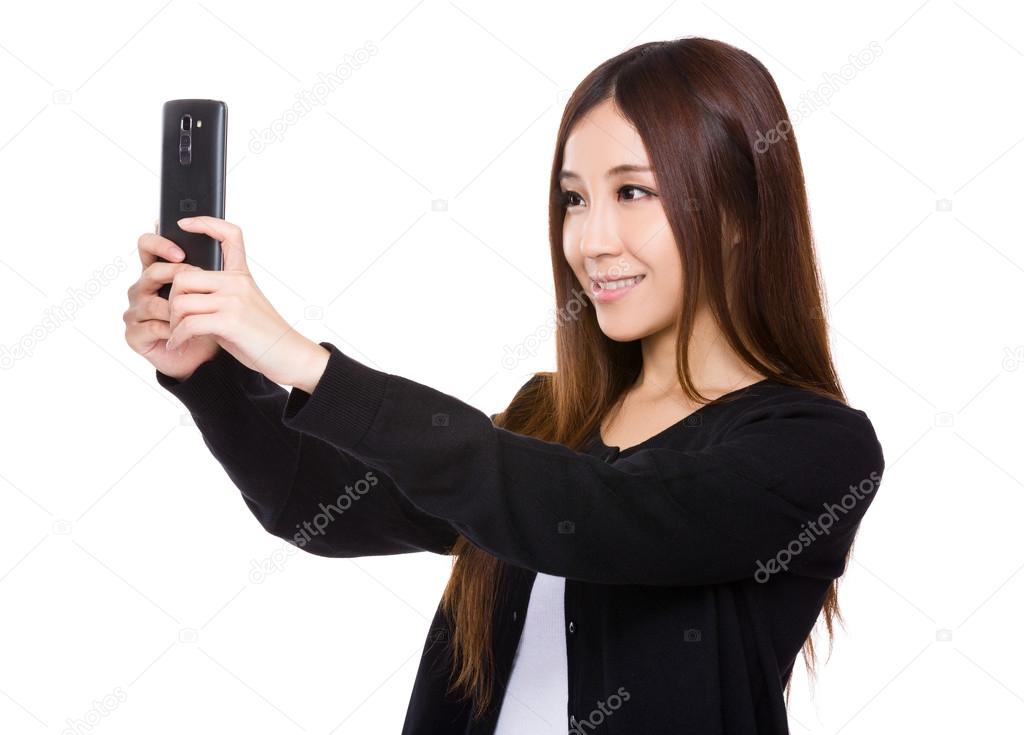 Asian young woman in black cardigan