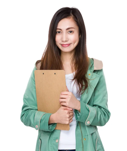 Asian young woman in green coat — Stock Photo, Image