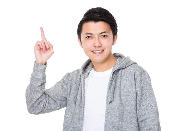 Asijský mladík v šedém svetru — Stock fotografie