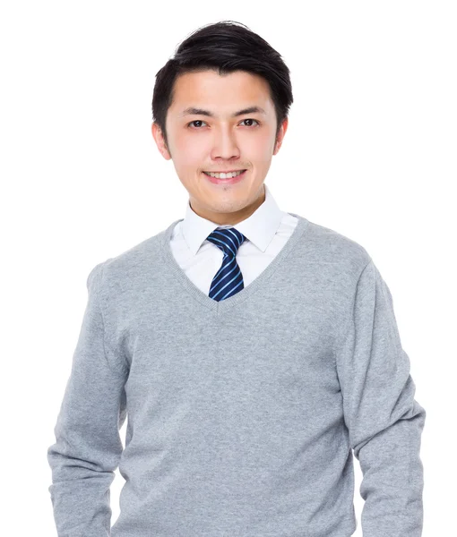 Młody biznesmen azjatyckich w szary sweter — Zdjęcie stockowe
