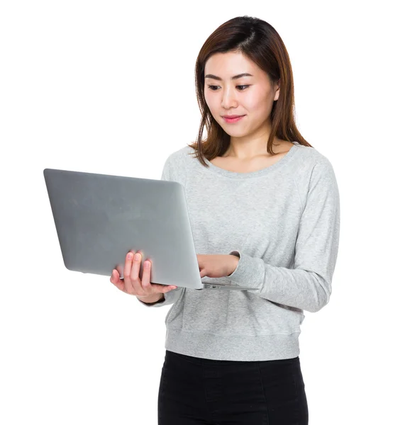 Asian young woman in grey sweater — Stock Photo, Image