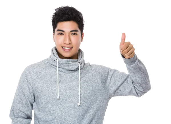 Азиатский юноша в сером свитере — стоковое фото